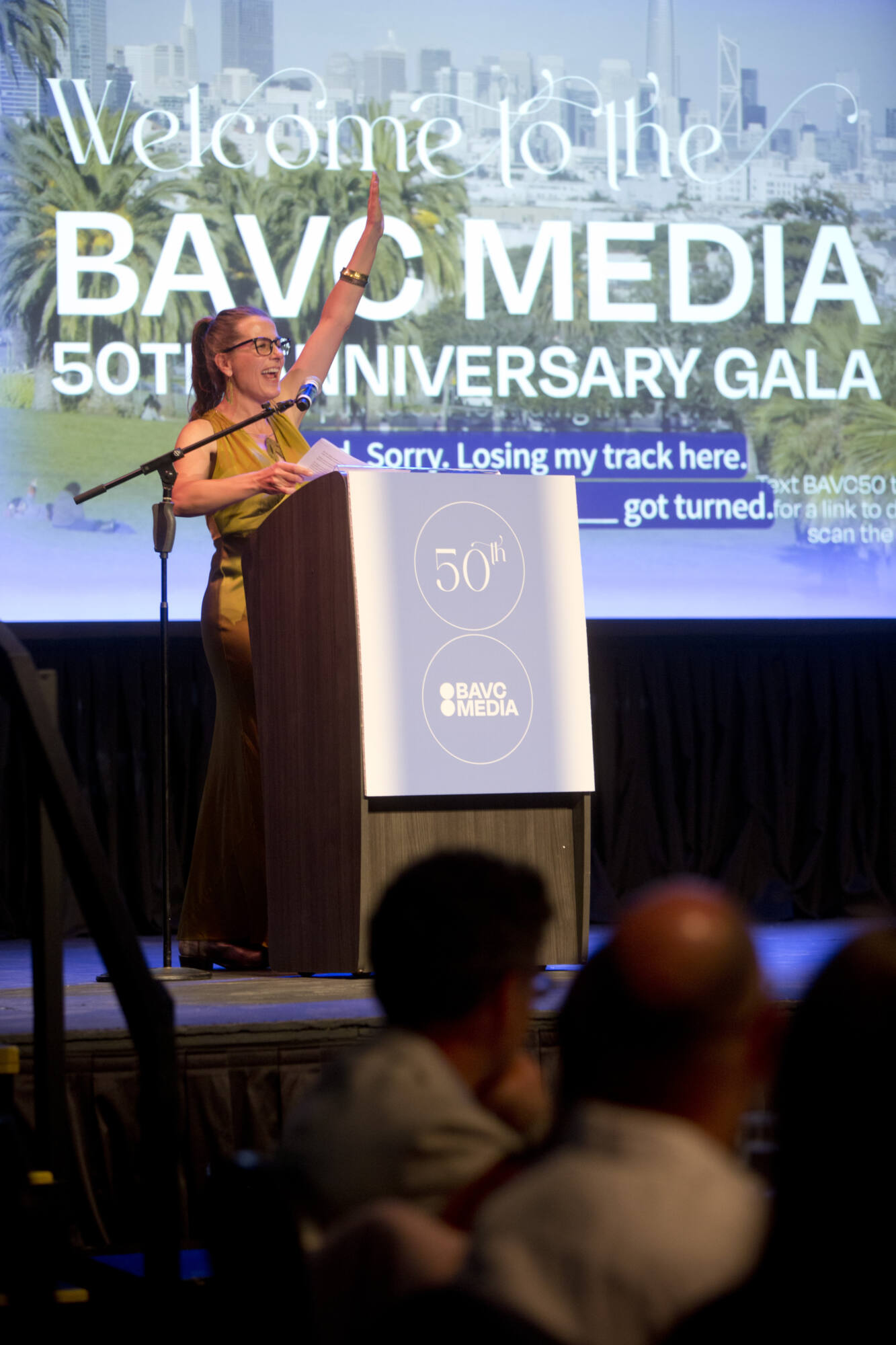 052026_BAVC50th_byTommyLau_HiRes_140 Executive Director Paula Smith Arrigoni, a white woman with light hair, giving a celebratory speech at a BAVC event.